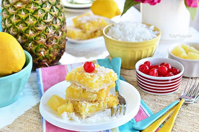 Channel the tropics, lounging on a white sandy beach, with these Pina Colada Bars. Enjoy the flavors of coconut and pinaple and consider it your ticket to a mental tropical paradise. grab the recipe at TidyMom.net