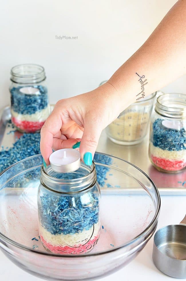 Patriotic Colored Rice Jar Candle centerpiece at TidyMom.net