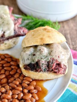Garlic and Dill Flank Steak Sliders served along side Bush's Brown Sugar Hickory Baked Beans for the perfect summer meal.