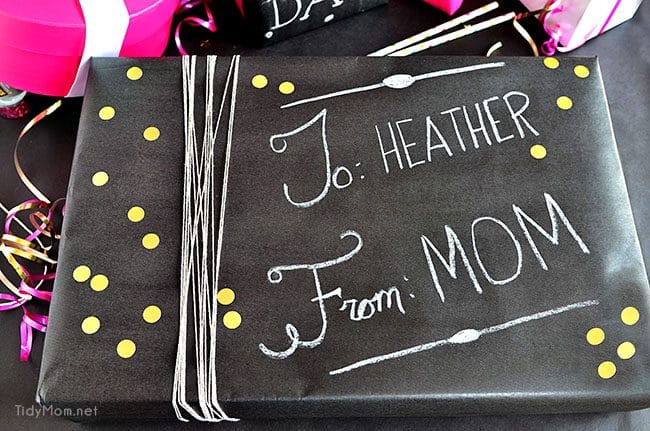 Such a fun inexpensive idea for gifting!!  DIY Chalkboard Gift Wrap at TidyMom.net