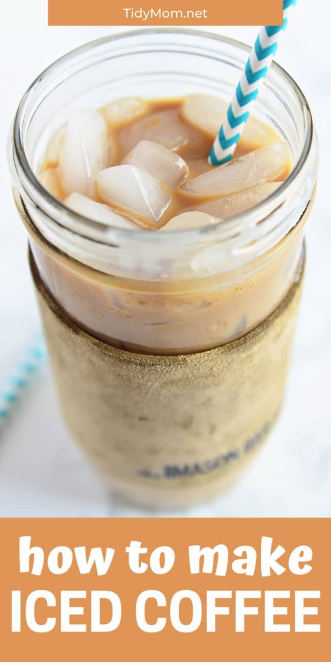 Iced coffee in glass with a straw