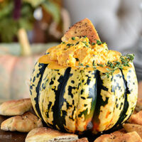 Butternut Squash Smoked Gouda Cheese Dip perfect for fall entertaining! Make this dip extra special by serving in a pumpkin! Get the recipe and holiday entertaining tips at TidyMom.net