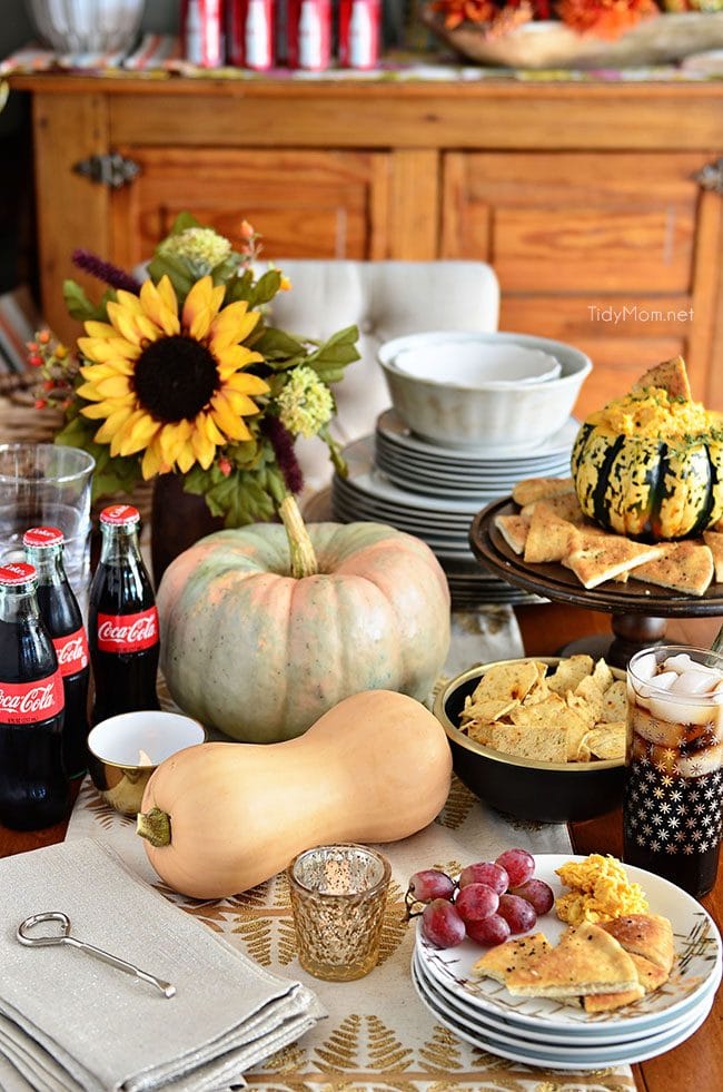 appetizers on a table with gourds