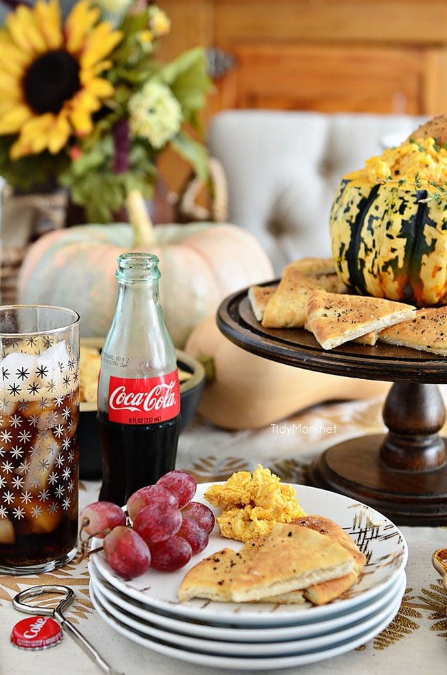 holiday table with appetizers and Coca Cola