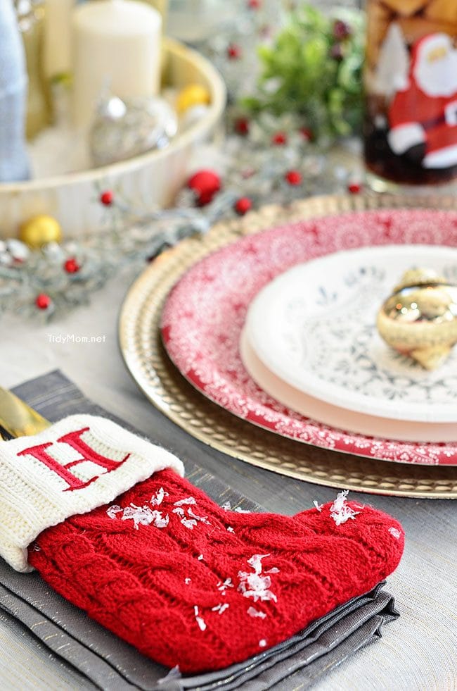 Use empty Cocoa Cola bottles as a pretty holiday table centerpiece. Just paint with glitter spray paint and add some holiday florals, and arrange on a tray. Easy and costs almost nothing! details at TidyMom.net