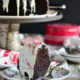 Chocolate Peppermint Brownie Cake uses a box cake mix + brownie mix! Easy recipe at TidyMom.net