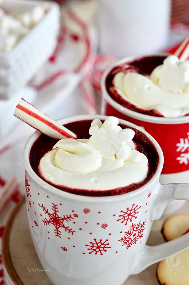 Red Velvet Hot Chocolate with Cream Cheese Whipped Cream with candy cane stick