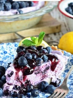 a slice of Blueberry Yogurt Pie on a plate