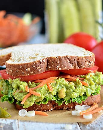 Avocado and chickpeas together make the most delicious sandwich spread! Get this Sweet Heat Chickpea Avocado Salad Sandwich recipe at TidyMom.net