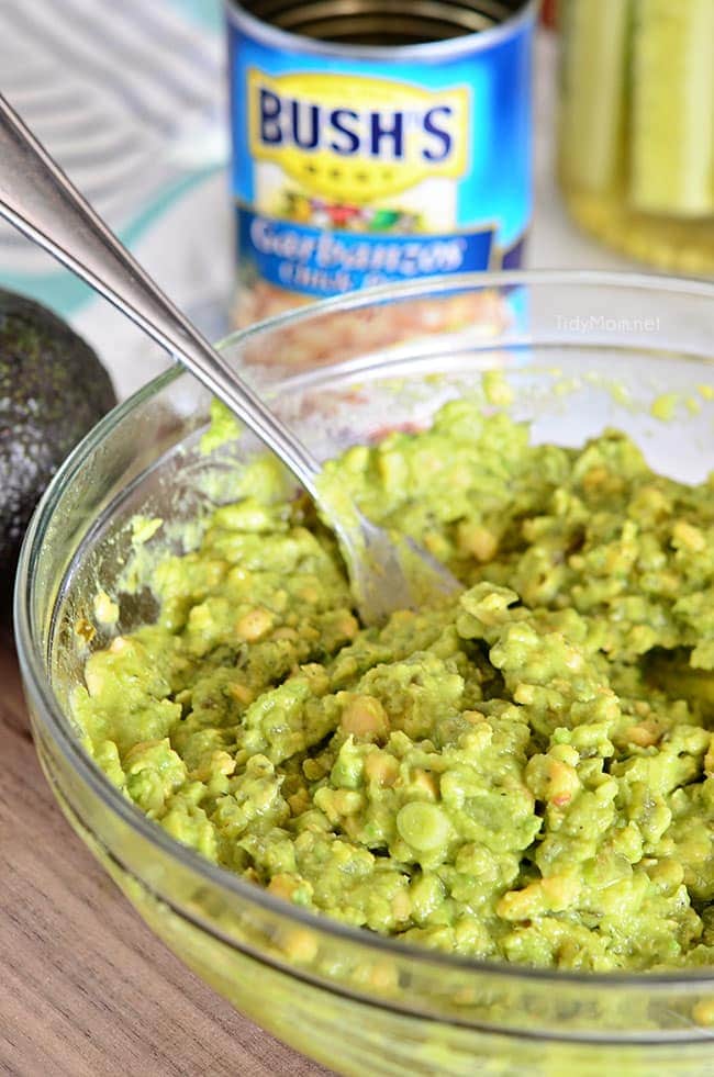 Smashed chickpeas and avocado together make the most delicious sandwich spread! Get this Sweet Heat Chickpea Avocado Salad Sandwich recipe at TidyMom.net