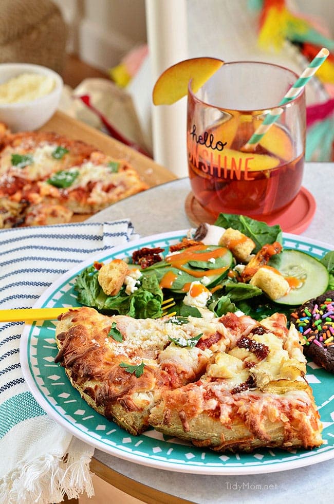 Girls Night Pizza Party! Customize a DIGIORNO Originial Rising Crust Four Cheese with your own toppings, like this Grilled Artichoke, Chicken and Sun-Dried Tomato Pizza with parmesan cheese. While the pizza bakes for about 20 minutes, set up a salad bar! Details at TidyMom.net