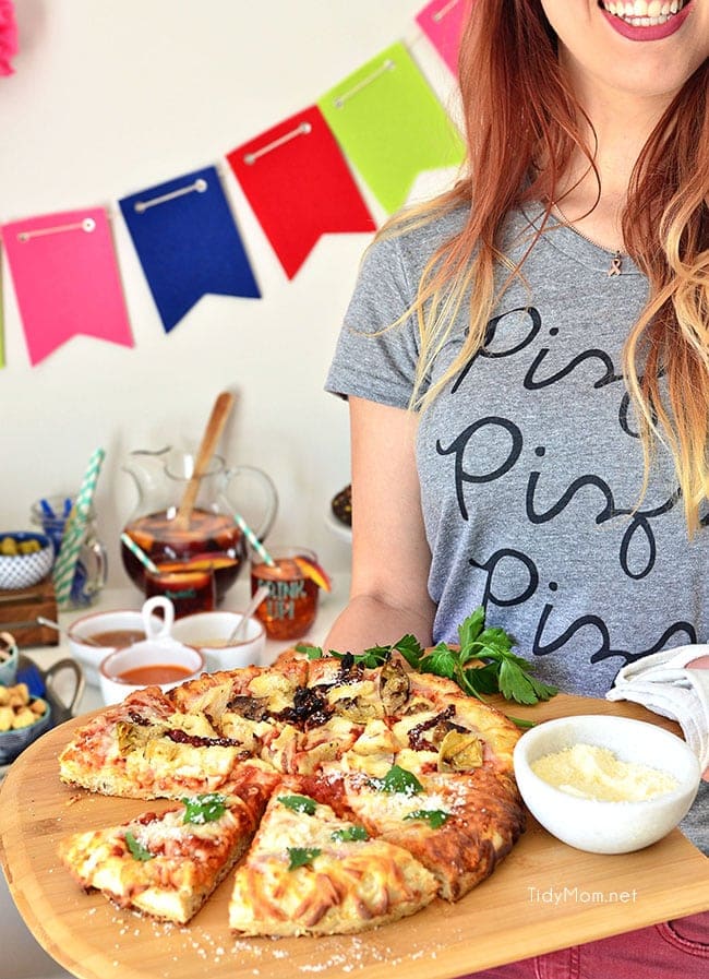 Girls Night Pizza Party! Customize a DIGIORNO Originial Rising Crust Four Cheese with your own toppings, like roasted artichokes, sundried tomatoes, grilled chicken and parmesan cheese. While the pizza bakes for 20 minutes, set up a salad bar! Details at TidyMom.net
