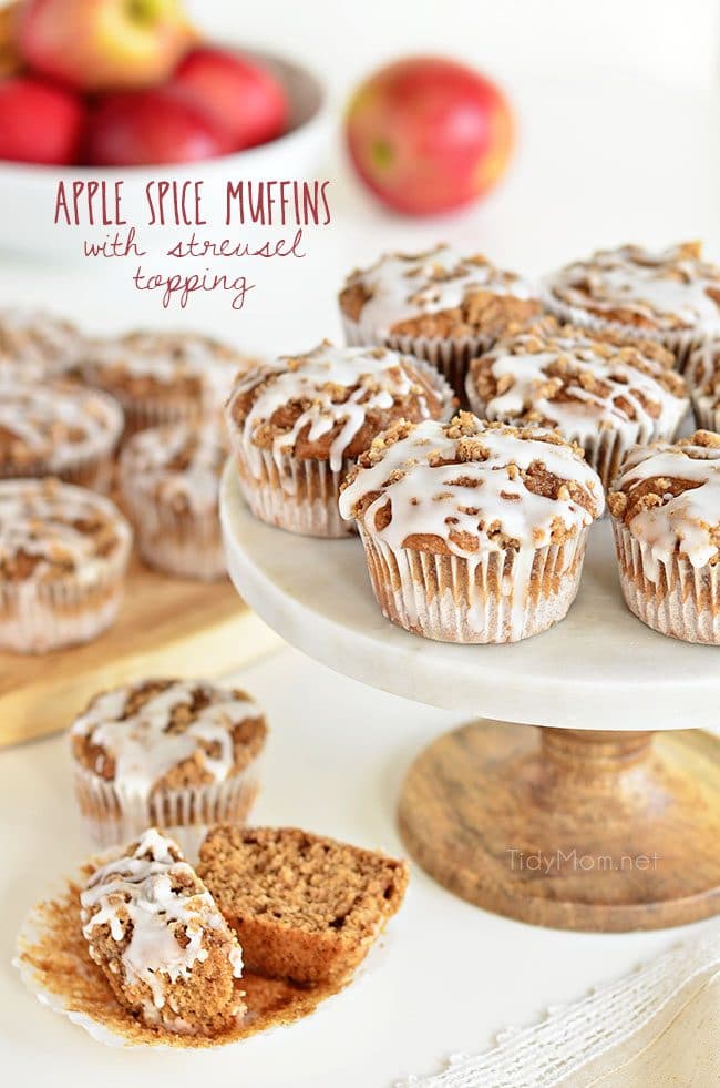 These Apple Spice muffins with Struesel Topping have a suprise ingredient that packs them with fiber!! Applesauce, spices, baked beans, crumb topping, vanilla glaze combine to create a delicious breakfast treat or afternoon snack. Bake a batch and enjoy the warm fall flavors! muffin recipe at TidyMom.net