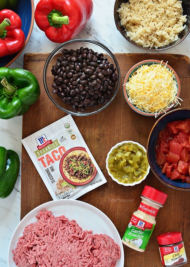 Fresh Bell peppers are filled with rice, browned ground beef seasoned with McCormick spices, black beans, tomatoes, green chilies and cheese for an easy weeknight dinner with a southwest twist. Southwest Stuffed Peppers recipe at TidyMom.net