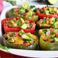 Fresh Bell peppers are filled with rice, browned ground beef seasoned with McCormick Organice Taco Seasoning, black beans, tomatoes, green chilies and cheese for an easy weeknight dinner with a southwest twist. Southwest Stuffed Peppers recipe at TidyMom.net