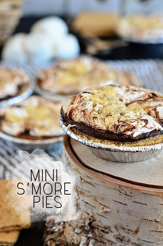 Mini S’more Pies are the perfect dessert for entertaining. Not only do they require very little work, but they can be made ahead of time. Serve warm, room temperature or chilled. Either way, it’s a chocolate, marshmallow, graham cracker deliciousness presented in the form of a decadent mini pie. Mini S’more Pies recipe at TidyMom.net