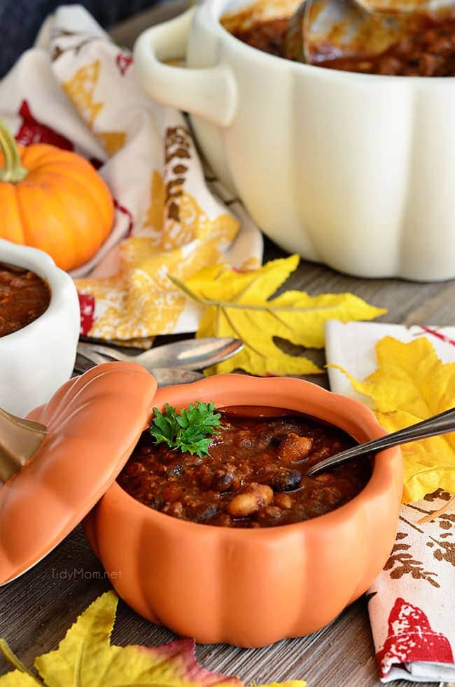 chili in a small orange pumpkin shaped bowl.