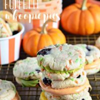 Funfetti Whoppie Pies are an easy and delicious cookie treat thanks to a box cake mix and canned frosting. Add seasonal sprinkles and food color to frosting. Get the recipe for these Halloween Funfetti Whoppie Pies at TidyMom.net