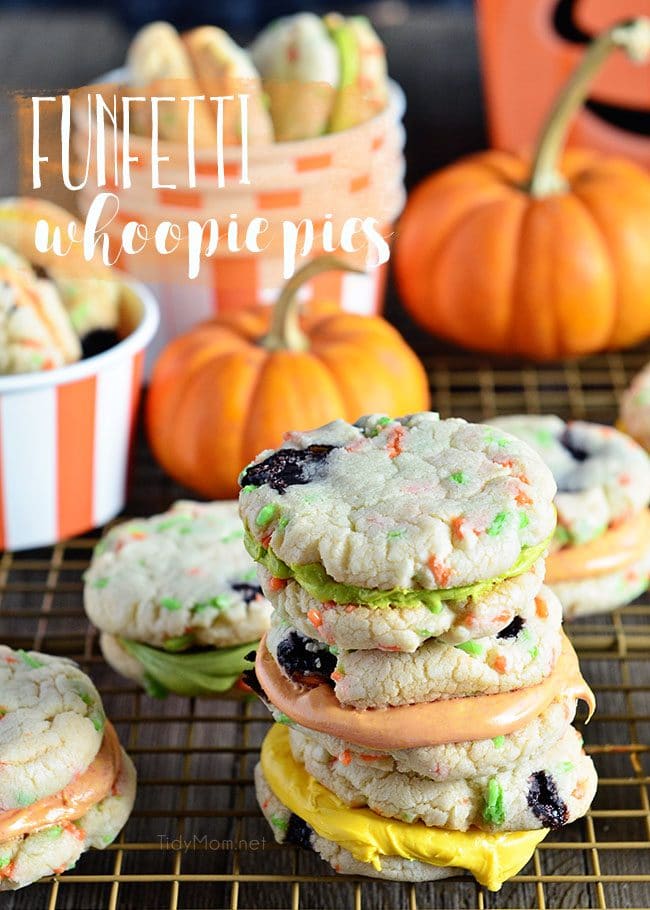 Funfetti Whoppie Pies are an easy and delicious cookie treat thanks to a box cake mix and canned frosting. Add seasonal sprinkles and food color to frosting. Get the recipe for these Halloween Funfetti Whoppie Pies at TidyMom.net