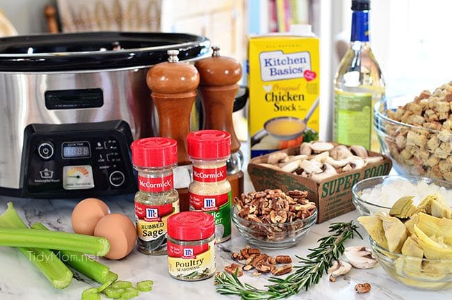 Slow Cooker Stuffing with artichokes, mushrooms and toasted pecans. Easy, flavorful and perfect for any holiday meal. Get the recipe at TidyMom.net