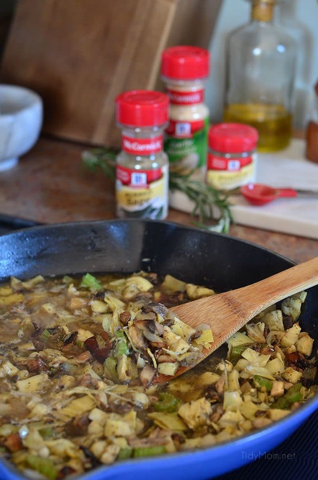 Slow Cooker Stuffing with artichokes, mushrooms and toasted pecans. Easy, flavorful and perfect for any holiday meal. Get the recipe at TidyMom.net