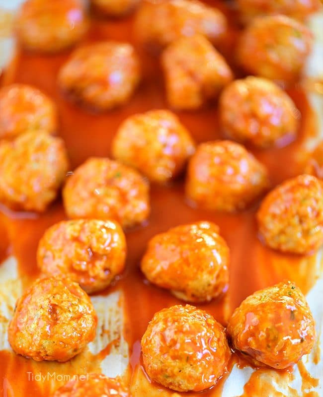 Crowd pleasing Buffalo Chicken Meatballs taste just like buffalo hot wings. Get the recipe at TidyMom.net