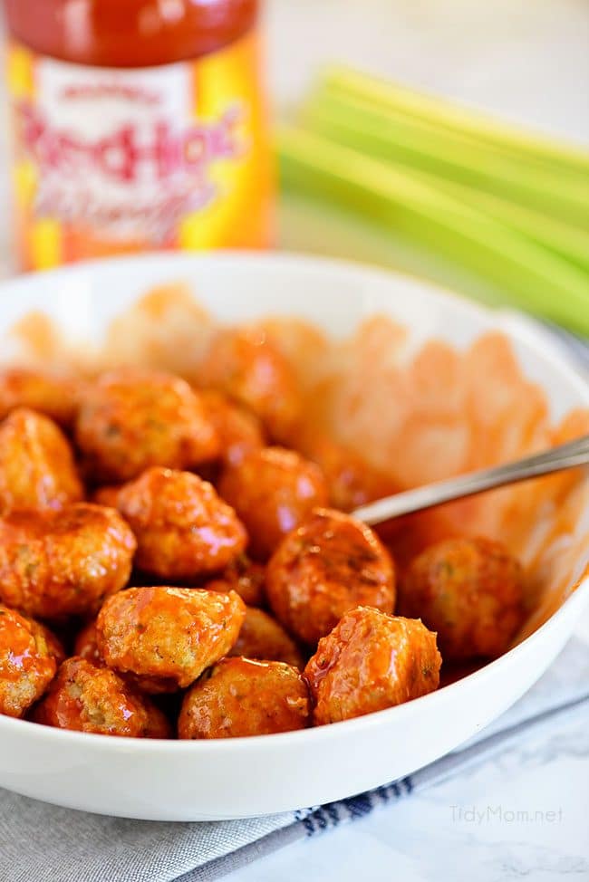 Crowd pleasing Buffalo Chicken Meatballs with Ranch taste just like buffalo hot wings. Get the recipe at TidyMom.net