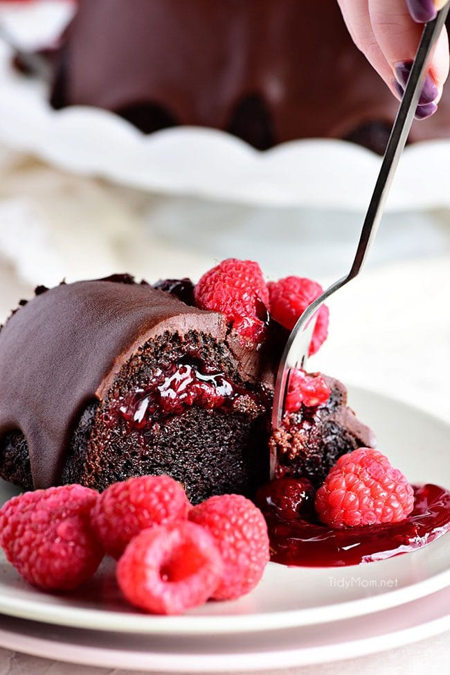 fork going into a slice of Chocolate Raspberry Bundt Cake 