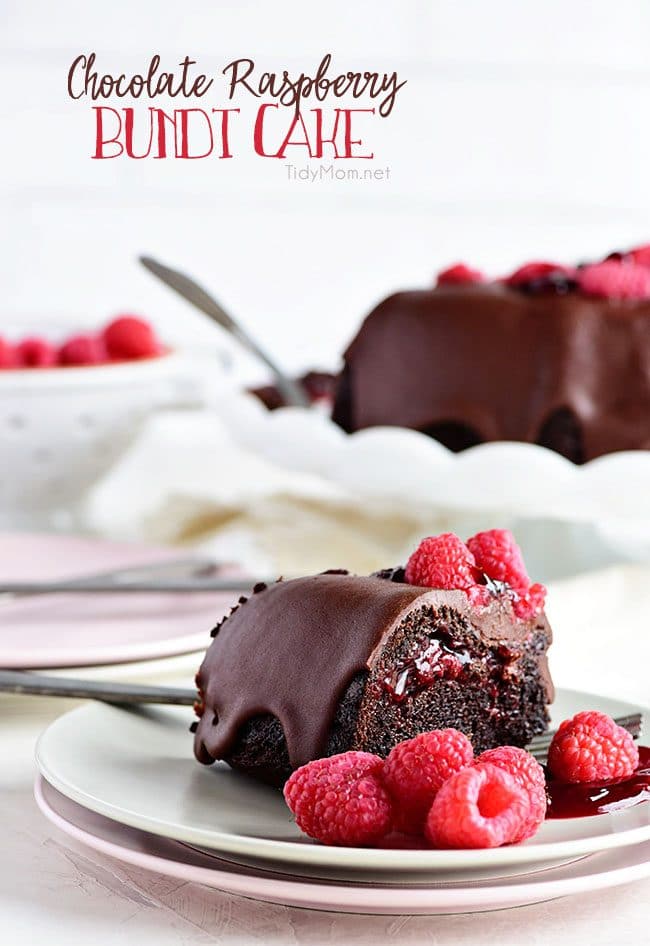 Chocolate Raspberry Bundt Cake with Chocolate Chambord Glaze on plate with fresh raspberries