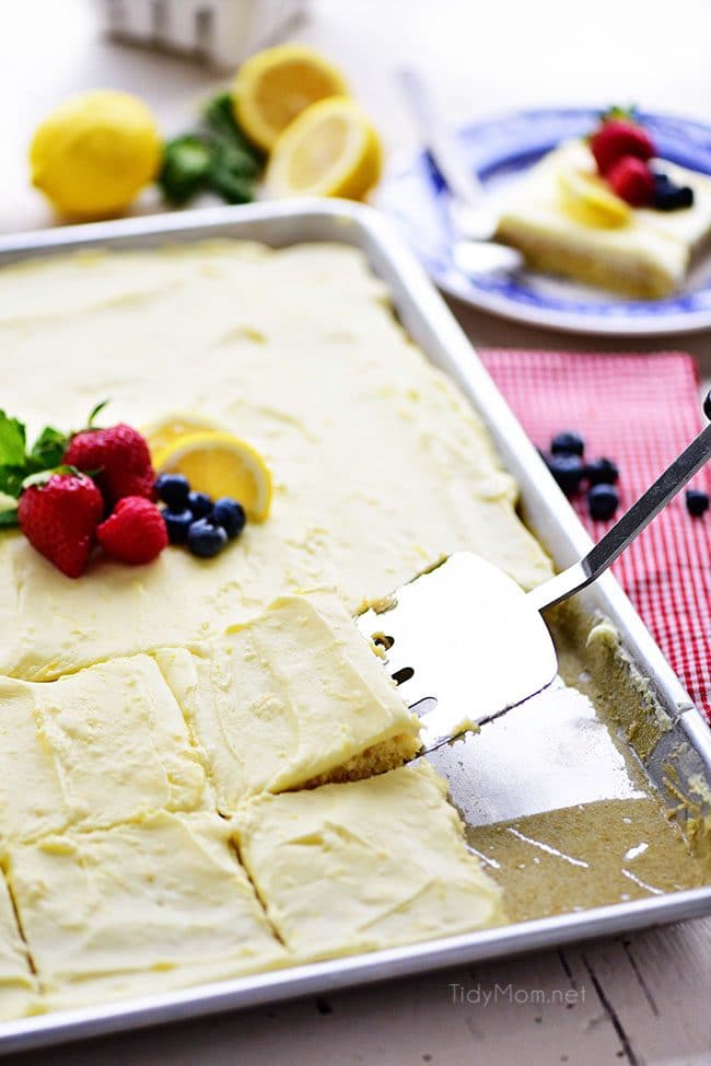 This no-fuss lemon sheet cake is super moist and makes a wonderful spring or summer dessert that easily feeds a crowd. It may not be a fancy cake, but each slice is pure lemon bliss! print full recipe at TidyMom.net