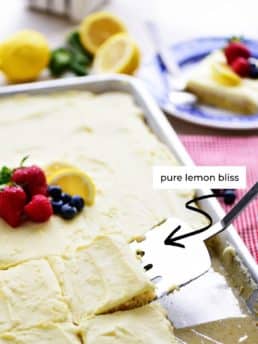 lemon sheet cake in a pan with fruit on top