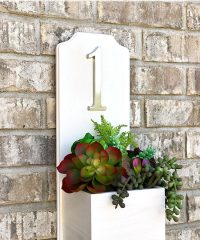 Increase your curb appeal with an address planter box. This DIY house number is super simple and quick to make and doesn’t require any tools. Get the full tutorial at TidyMom.net