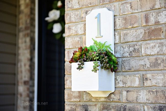 Increase your curb appeal with an address planter box. This DIY house number is super simple and quick to make and doesn’t require any tools. Get the full tutorial at TidyMom.net