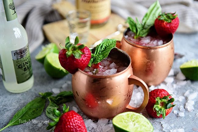 Strawberry Basil Moscow Mule is the perfect summer cocktail. Made like a traditional Moscow Mule with vodka, ginger beer and lime, with the addition of muddled fresh juicy strawberries and basil. 