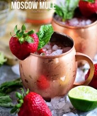 Strawberry Basil Moscow Mule is the perfect summer cocktail. Made like a traditional Moscow Mule with vodka, ginger beer and lime, with the addition of muddled fresh strawberries and basil. Print the recipe at TidyMom.net