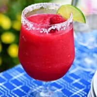 Frozen Rasberry Margarita is the perfect summer cocktail. Raspberry sorbet makes a refreshing twist on the traditional margarita, for a cool party sip! Get the full recipe at TidyMom.net