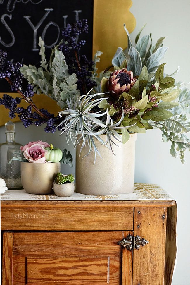 Seasonal Simplicity — Blue and Green Fall Tablescape and centerpiece with a touch of pink . Get all the details along with 20+ Fall Home Tours at TidyMom.net