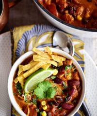 This flavorful Creamy Taco Chili is packed with lots of beans, chicken and other taco inspired ingredients. The perfect way to warm up on a chilly day! Printable recipe + video at TidyMom.net