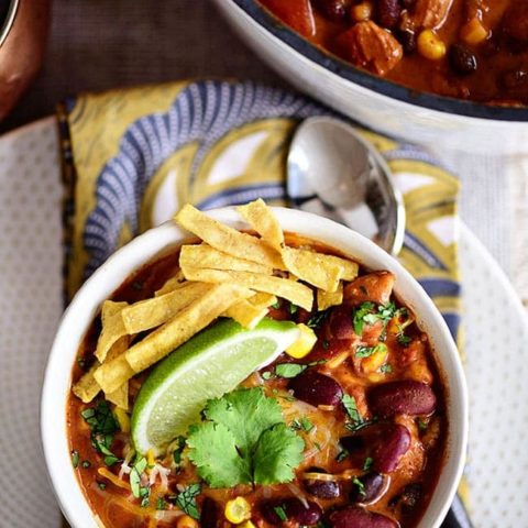 This flavorful Creamy Taco Chili is packed with lots of beans, chicken and other taco inspired ingredients. The perfect way to warm up on a chilly day! Printable recipe + video at TidyMom.net