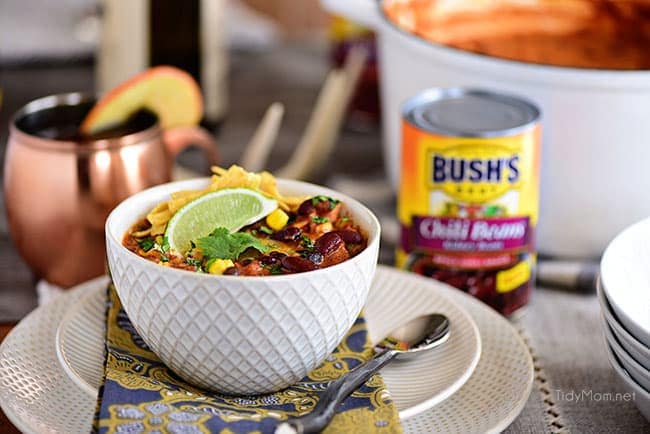 This flavorful Creamy Taco Chili is packed with lots of beans, chicken and other taco inspired ingredients. The perfect way to warm up on a chilly day! Printable recipe + video at TidyMom.net