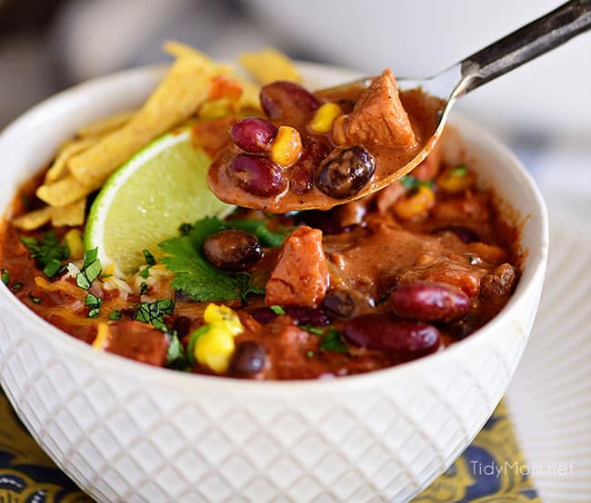 This flavorful Creamy Taco Chili is packed with lots of beans, chicken and other taco inspired ingredients. The perfect way to warm up on a chilly day! Printable recipe + video at TidyMom.net