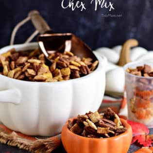 Pumpkin Spice Chex Mix is loaded with sweet and spicy coated cereal and pecans for party or game day snacking! Print the recipe at TidyMom.net