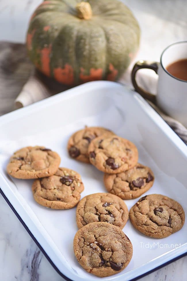 Bring a taste of fall to your chocolate chip cookies thanks to a box of pumpkin pudding mix. These Pumpkin Spice Cookies are soft, delicious and loaded with chocolate chips and pecans. If you haven’t had a pudding cookie, you don’t know what you’re missing. SO delicious!!