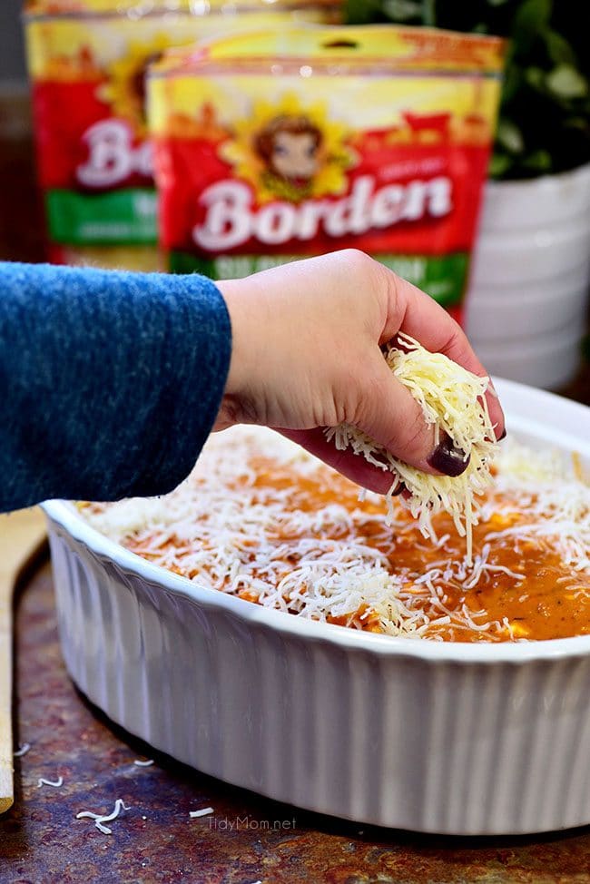 Borden Cheese makes this easy Cheesy Ravioli Bake Casserole with Chicken impossible to resist. 