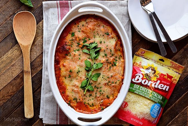 Borden Cheese makes this easy Cheesy Ravioli Bake Casserole with Chicken impossible to resist. 