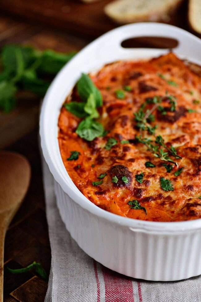 Ravioli Bake in a white casserole dish