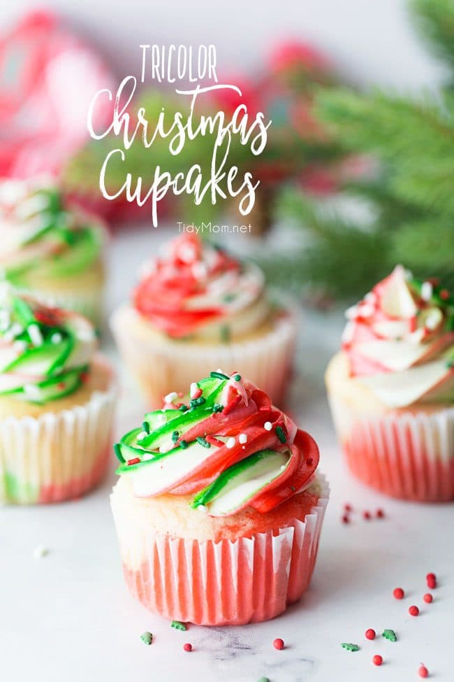 Very Merry Tricolor Christmas Cupcakes in red, green and white with a hint of peppermint! See how to make these fun colorful marble cupcakes and frosting at TidyMom.net