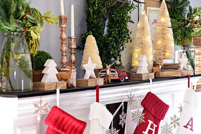 Christmas Mantel Decor with rustic neutrals and a touch of red and green. 