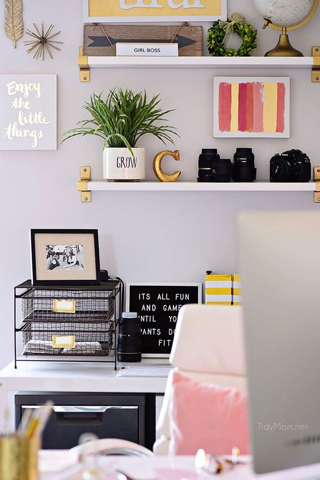 Decorating a shared office, with colorful industrial style. Her side is pink and gold, while his is black and neutrals. Check out the gold coffee cart!! Get all the details of this shared home office space at TidyMom.net