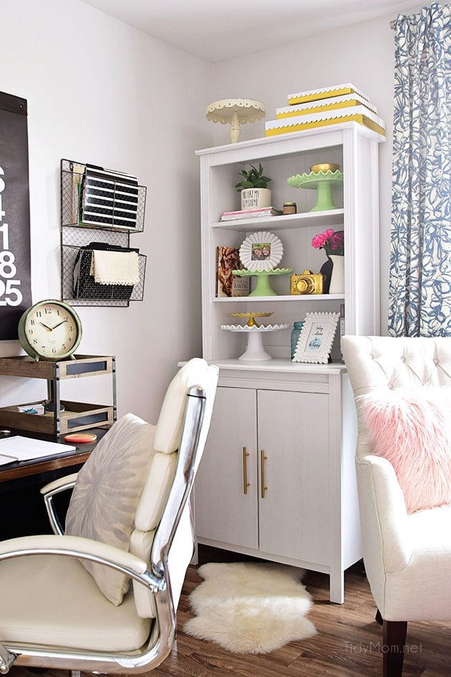 Decorating a shared office, with colorful industrial style. Her side is pink and gold, while his is black and neutrals. Check out the gold coffee cart!! Get all the details of this shared home office space at TidyMom.net